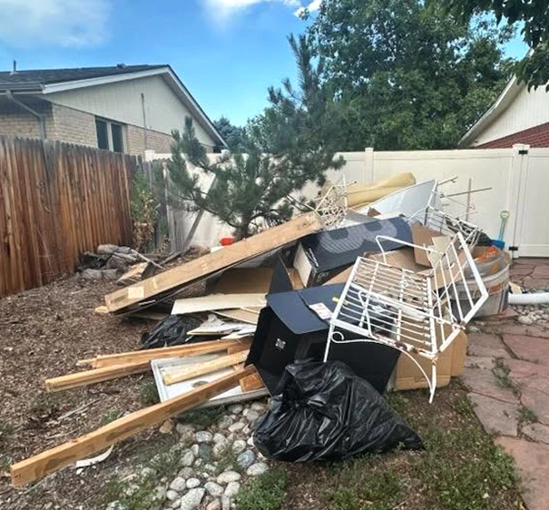 Outdoor property cleanout in Arvada Colorado